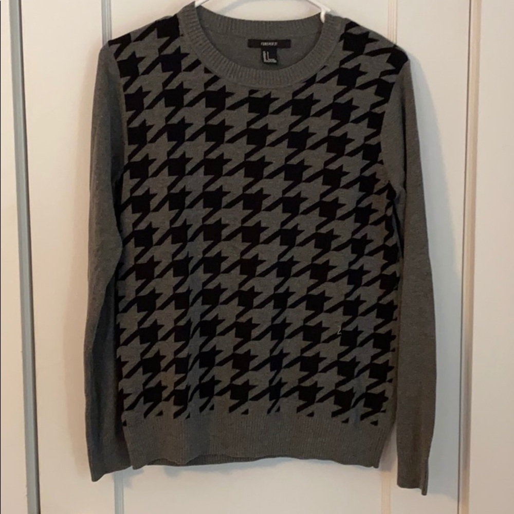 Gray and black houndstooth sweater